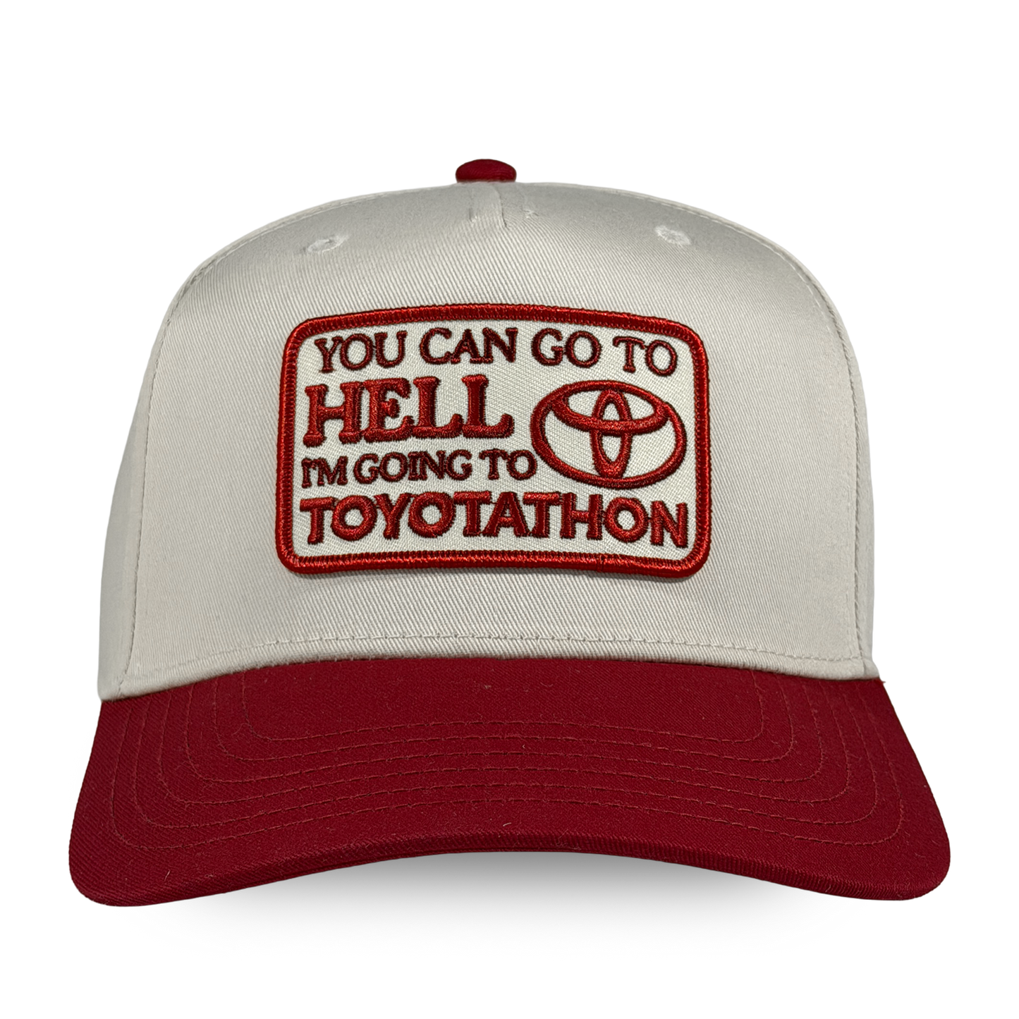 Cap with embroidered text and Toyotathon logo on a white background - You can go to hell i'm going to toyotathon crying in the club shirts hat