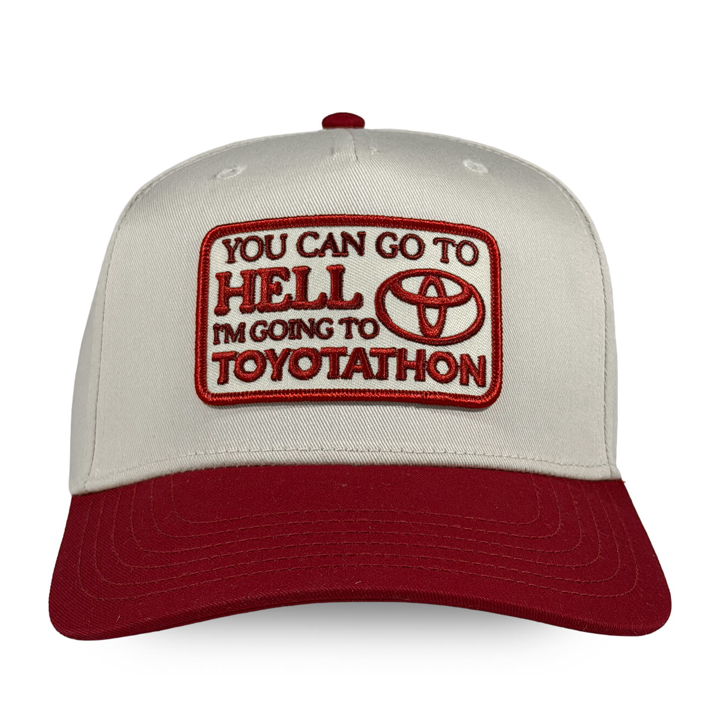 Cap with embroidered text and Toyotathon logo on a white background - You can go to hell i'm going to toyotathon crying in the club shirts hat