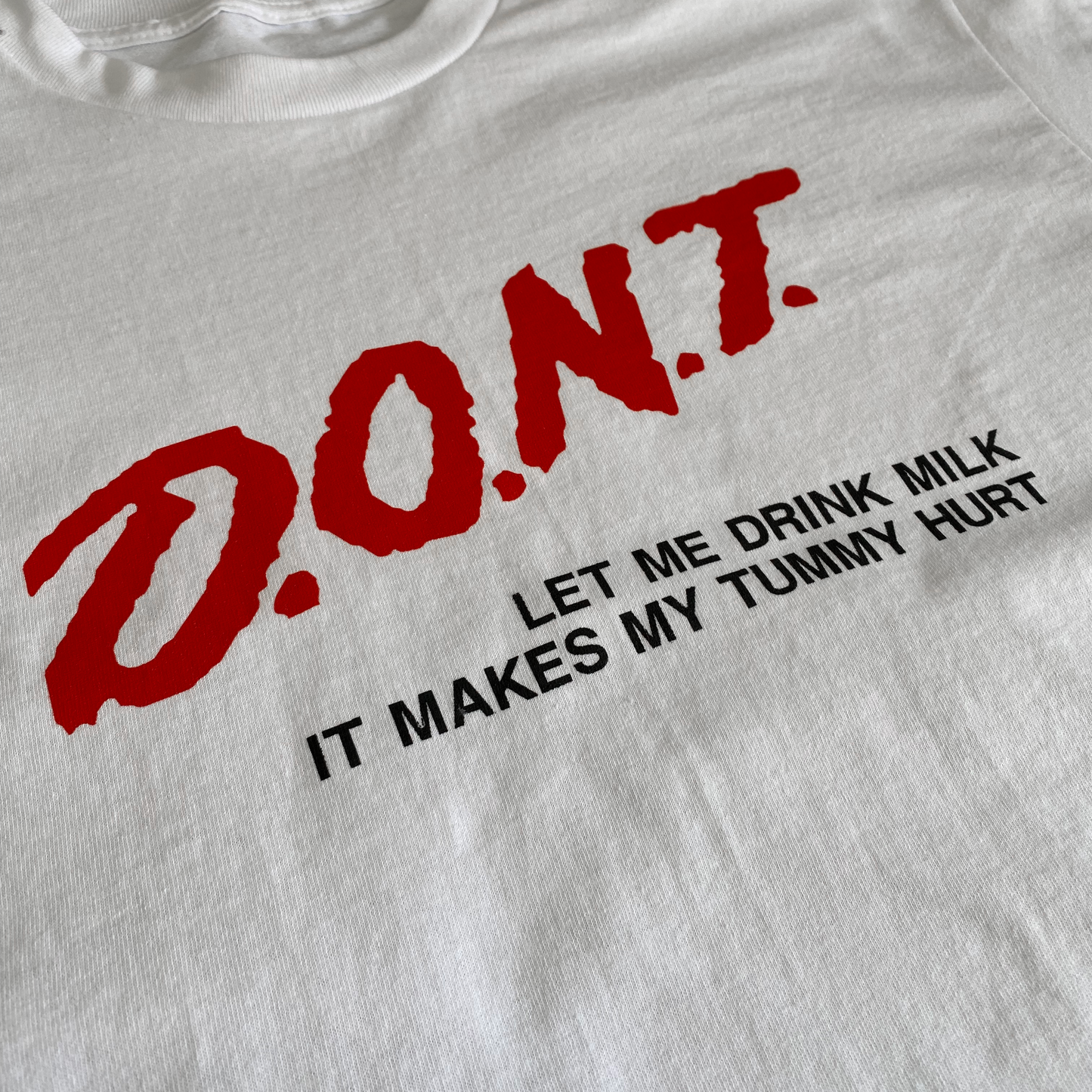 DONT LET ME DRINK MILK IT MAKES MY TUMMY SHIRT DARE SHIRT